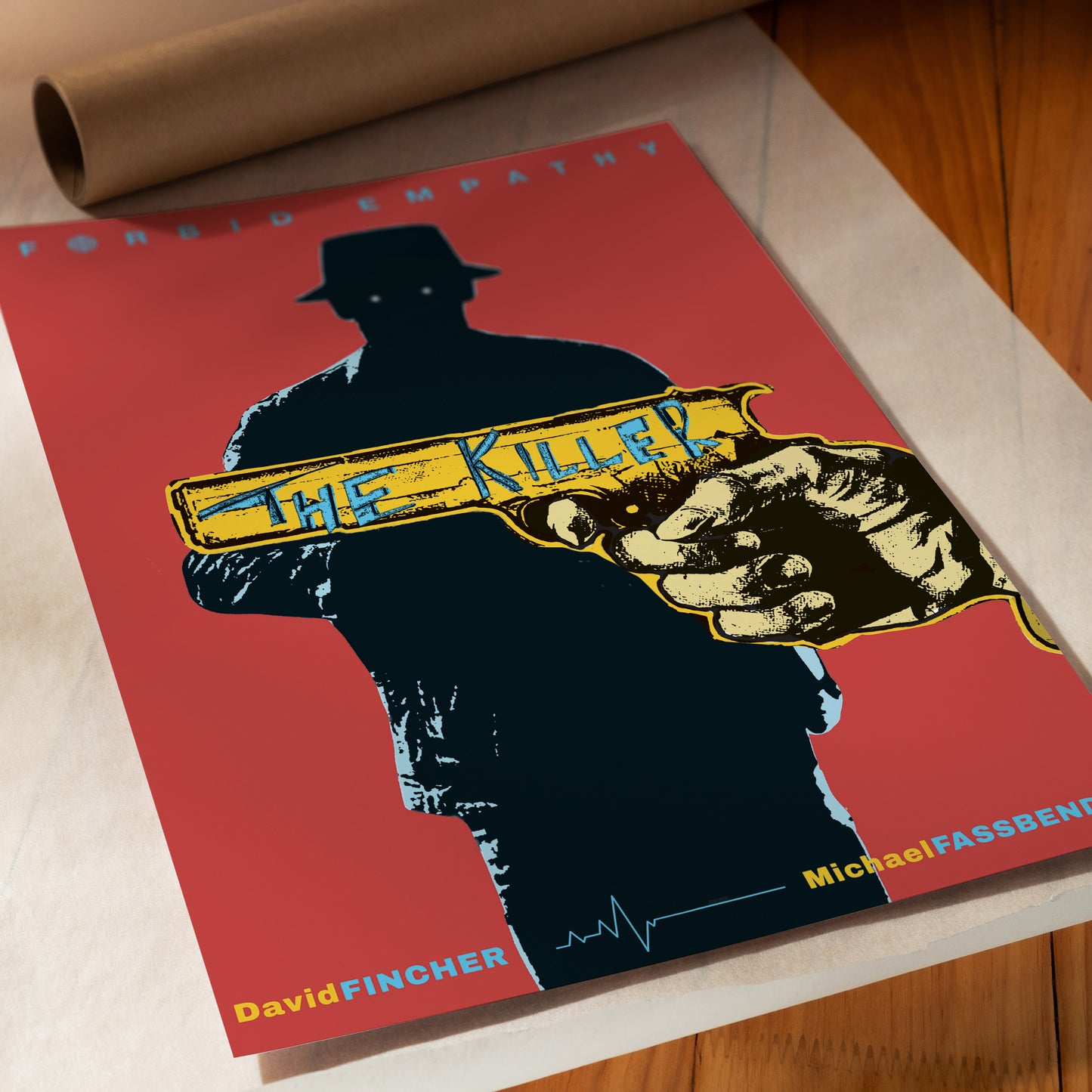 Movie poster for 'The Killer' with a silhouette of a man holding a gun on a red background.