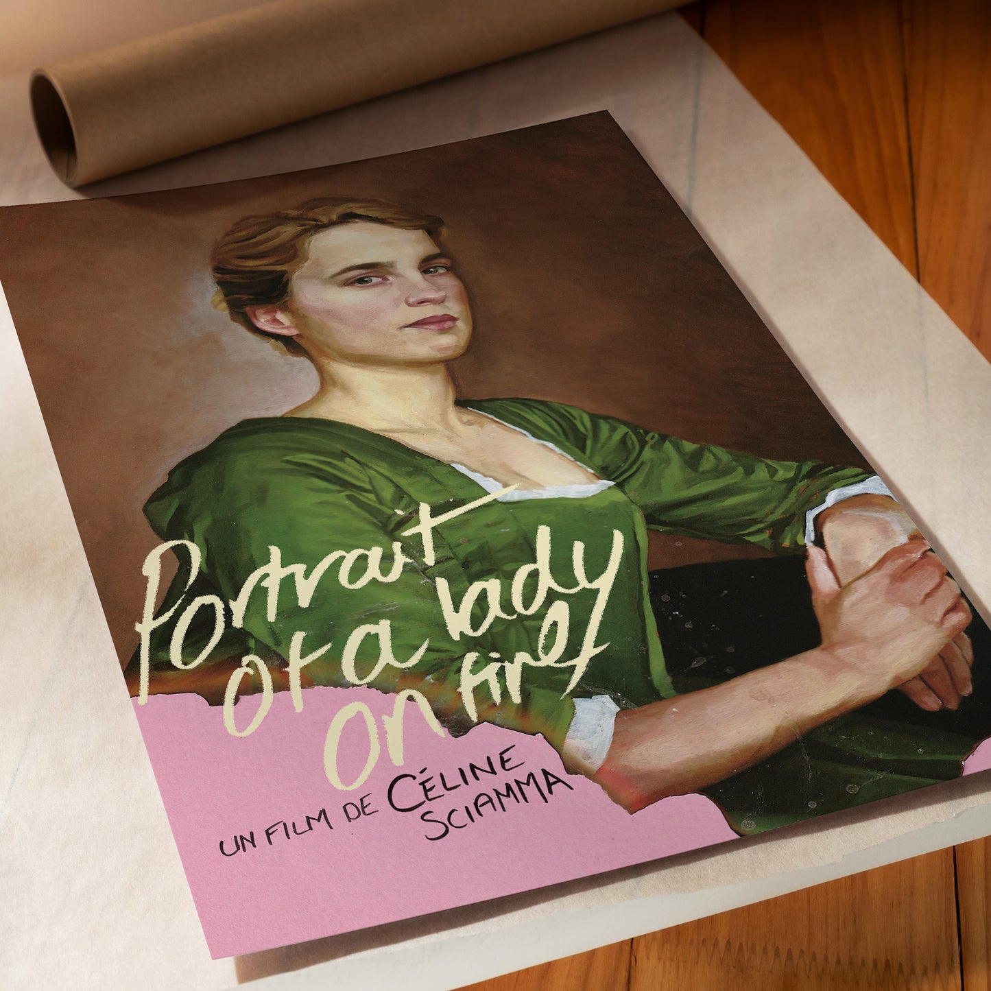 Movie poster for 'Portrait of a Lady on Fire' with a woman in a green dress.