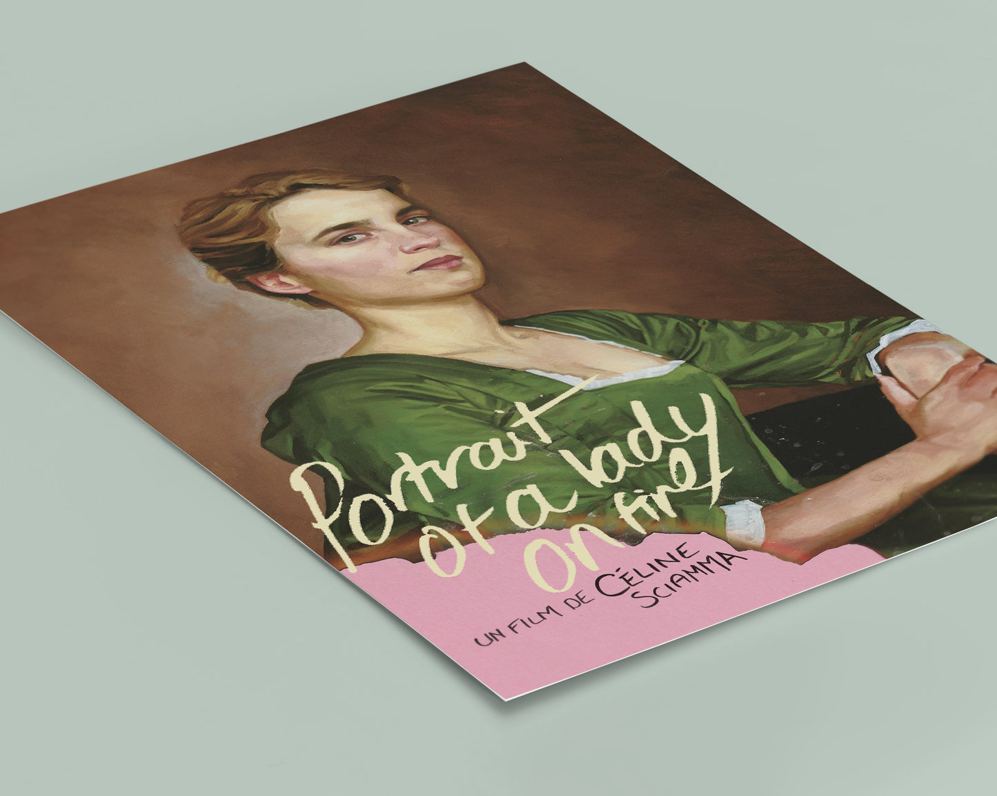 Movie poster for 'Portrait of a Lady on Fire' with a stylized portrait of a woman.
