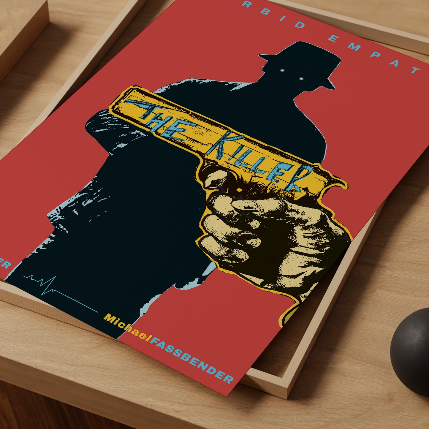 Book cover of 'The Killer' with a silhouette holding a gun on a red background