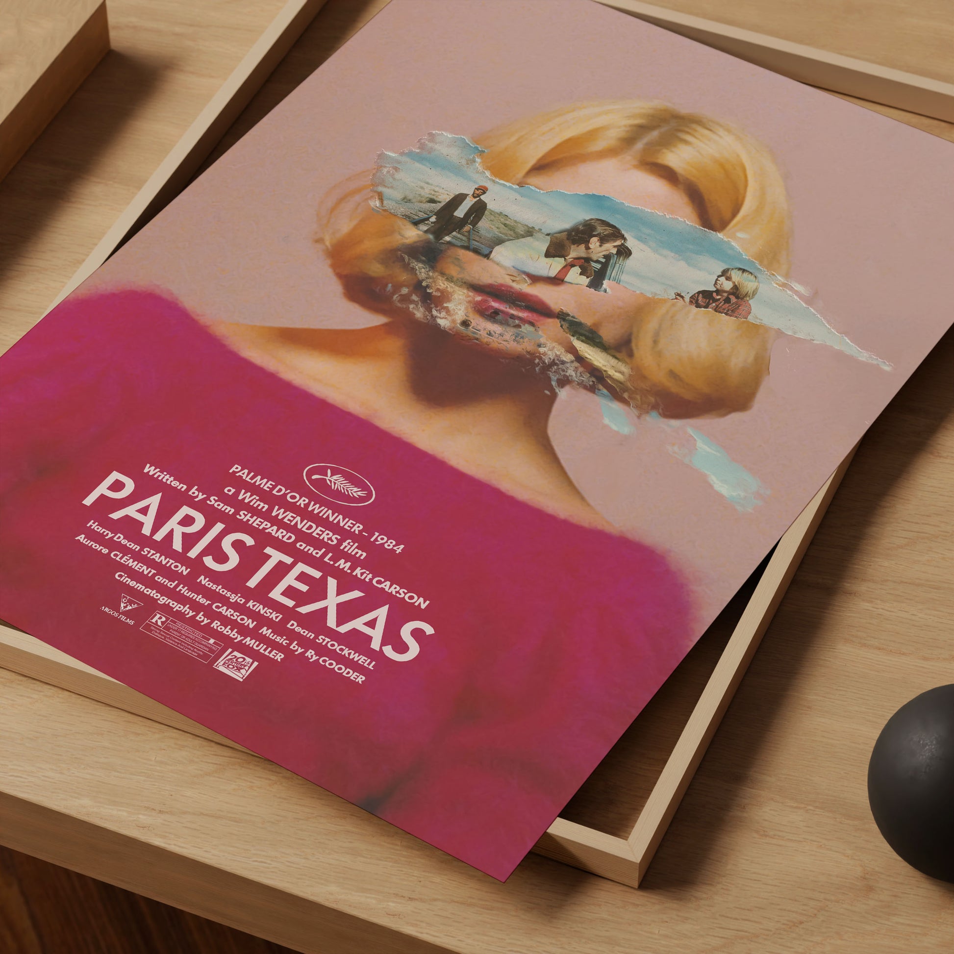 Poster of 1984 movie Paris, Texas.  Wim Wender's movie Paris Texas movie print. With a woman's face and landscape elements on a pink background.